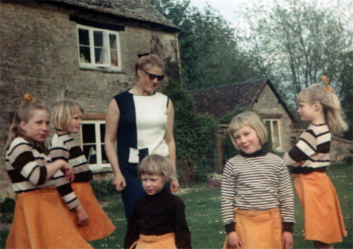 5 sisters in orange skirts